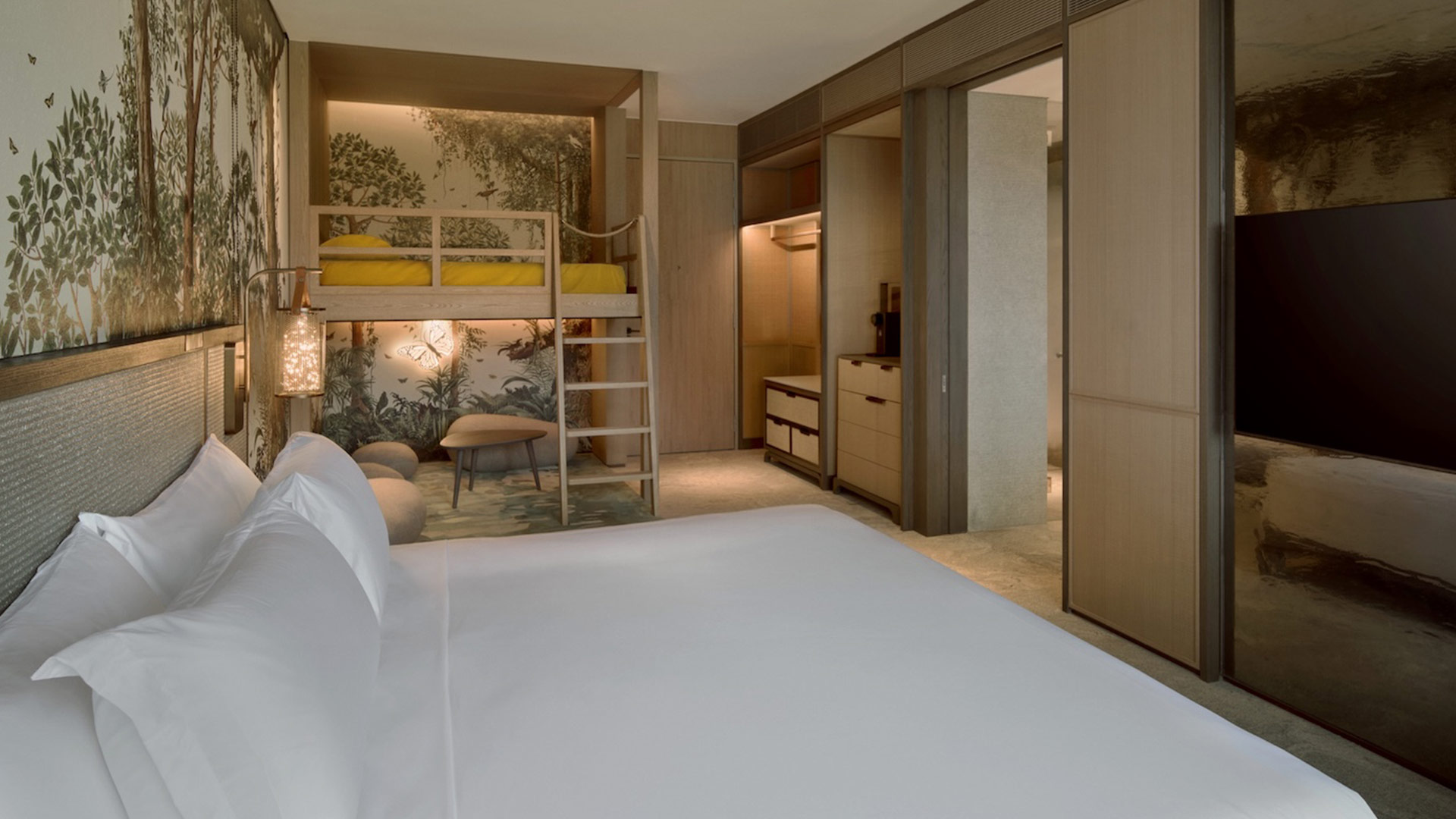 Stay at Mandai Rainforest Resort by Banyan Tree and discover the wild after dark at Night Safari. 